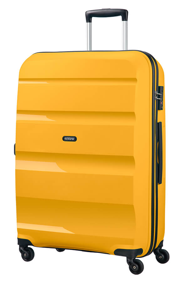american tourister yellow luggage